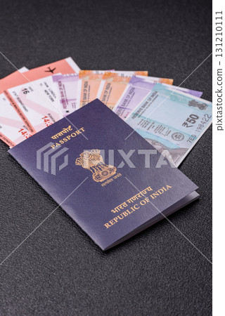 Indian passport and tickets for travelling, flying and doing business. India document, id Indian passport and tickets for travelling, flying and doing business. India document, id 131210111