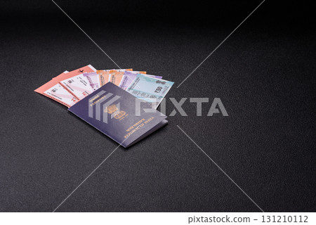 Indian passport and tickets for travelling, flying and doing business. India document, id 131210112