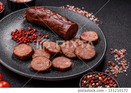 Homemade meat or vegan sausage grilled with spices. Homemade sausage cooked on barbecue Homemade meat or vegan sausage grilled with spices. Homemade sausage cooked on barbecue 131210172