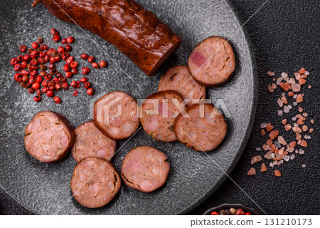 Homemade meat or vegan sausage grilled with spices. Homemade sausage cooked on barbecue Homemade meat or vegan sausage grilled with spices. Homemade sausage cooked on barbecue 131210173