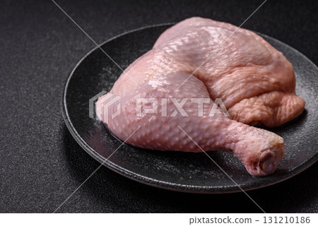 Chicken raw leg or quarter, fresh meat for cooking on barbecue. Chicken quarter 131210186