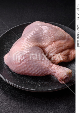 Chicken raw leg or quarter, fresh meat for cooking on barbecue. Chicken quarter 131210189