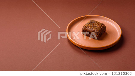 Chocolate brownie cake, food, sweet dessert with nuts rectangular shape. Sweet chocolate brownie 131210303