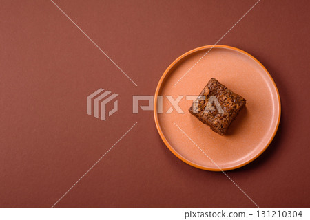 Chocolate brownie cake, food, sweet dessert with nuts rectangular shape. Sweet chocolate brownie 131210304