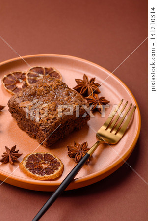 Chocolate brownie cake, food, sweet dessert with nuts rectangular shape. Sweet chocolate brownie Chocolate brownie cake, food, sweet dessert with nuts rectangular shape. Sweet chocolate brownie 131210314