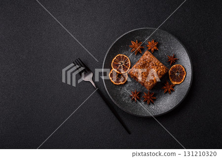 Chocolate brownie cake, food, sweet dessert with nuts rectangular shape. Sweet chocolate brownie Chocolate brownie cake, food, sweet dessert with nuts rectangular shape. Sweet chocolate brownie 131210320