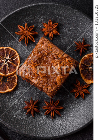 Chocolate brownie cake, food, sweet dessert with nuts rectangular shape. Sweet chocolate brownie Chocolate brownie cake, food, sweet dessert with nuts rectangular shape. Sweet chocolate brownie 131210325
