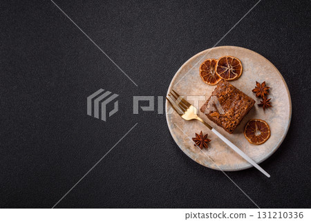 Chocolate brownie cake, food, sweet dessert with nuts rectangular shape. Sweet chocolate brownie 131210336