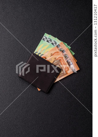 Paper money, euro notes, cash for savings and investments. Euro paper cash Paper money, euro notes, cash for savings and investments. Euro paper cash 131210417
