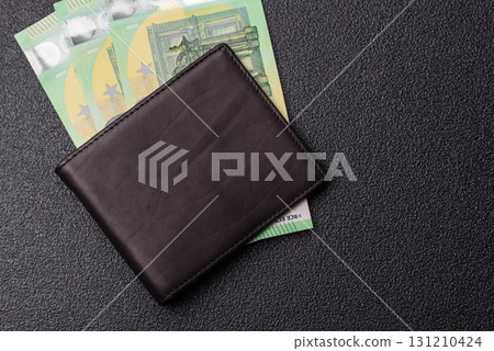 Paper money, euro notes, cash for savings and investments. Euro paper cash Paper money, euro notes, cash for savings and investments. Euro paper cash 131210424