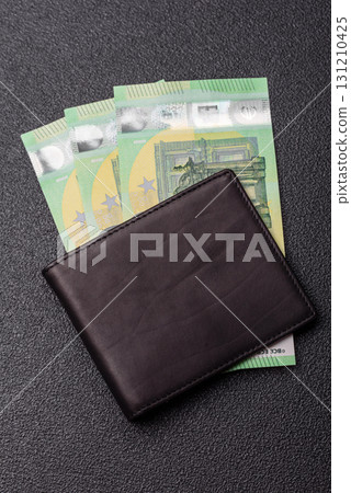 Paper money, euro notes, cash for savings and investments. Euro paper cash Paper money, euro notes, cash for savings and investments. Euro paper cash 131210425