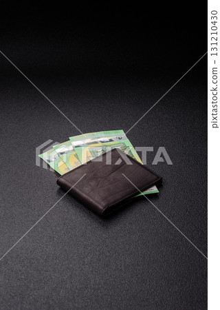 Paper money, euro notes, cash for savings and investments. Euro paper cash Paper money, euro notes, cash for savings and investments. Euro paper cash 131210430