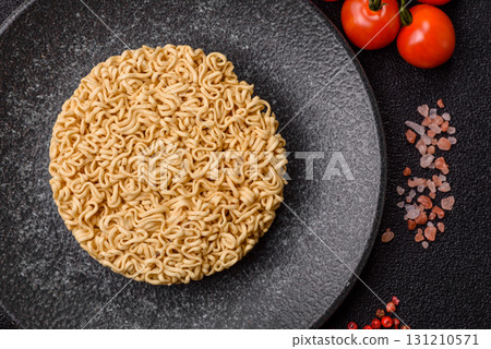 Instant noodles or ramen, Asian food, pasta with vegetables. Noodles, takeaway food Instant noodles or ramen, Asian food, pasta with vegetables. Noodles, takeaway food 131210571
