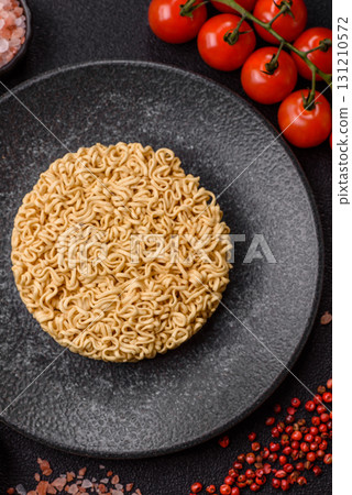 Instant noodles or ramen, Asian food, pasta with vegetables. Noodles, takeaway food Instant noodles or ramen, Asian food, pasta with vegetables. Noodles, takeaway food 131210572