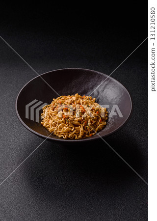 Instant noodles or ramen, Asian food, pasta with vegetables. Noodles, takeaway food 131210580