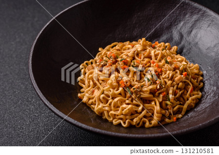 Instant noodles or ramen, Asian food, pasta with vegetables. Noodles, takeaway food 131210581