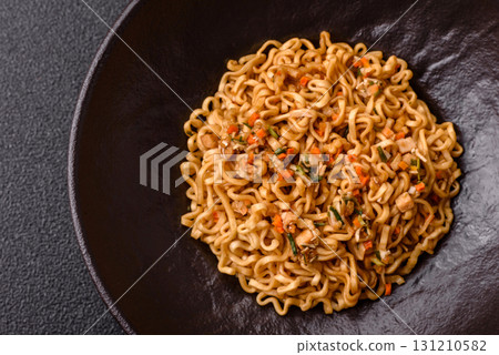 Instant noodles or ramen, Asian food, pasta with vegetables. Noodles, takeaway food 131210582