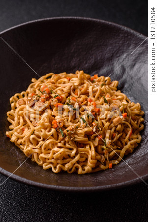 Instant noodles or ramen, Asian food, pasta with vegetables. Noodles, takeaway food Instant noodles or ramen, Asian food, pasta with vegetables. Noodles, takeaway food 131210584