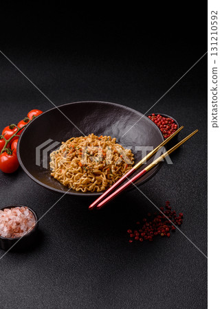 Instant noodles or ramen, Asian food, pasta with vegetables. Noodles, takeaway food Instant noodles or ramen, Asian food, pasta with vegetables. Noodles, takeaway food 131210592