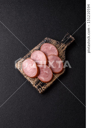 Sliced ham, meat, pork or turkey sausage for sandwiches. Ham slices, food Sliced ham, meat, pork or turkey sausage for sandwiches. Ham slices, food 131210594