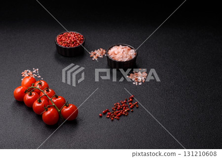 Ingredients for cooking cherry tomatoes, salt, spices and herbs Ingredients for cooking cherry tomatoes, salt, spices and herbs 131210608