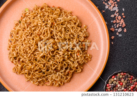 Instant noodles or ramen, Asian food, pasta with vegetables. Noodles, takeaway food Instant noodles or ramen, Asian food, pasta with vegetables. Noodles, takeaway food 131210623