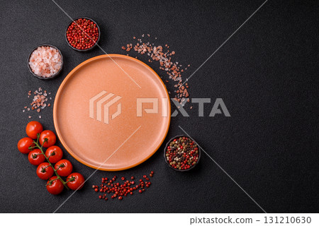 Empty ceramic plate on a monochrome brown background. Empty plate 131210630