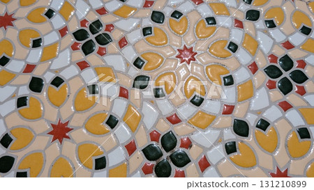 A vibrant geometric mosaic tile pattern that captivates with its elegance and artistry A vibrant geometric mosaic tile pattern that captivates with its elegance and artistry 131210899