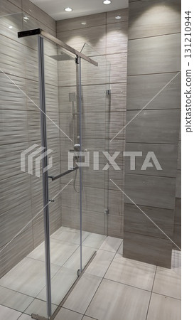 A Beautiful Modern Glass Shower Design Incorporating Elegant and Stylish Tiles for Your Bath A Beautiful Modern Glass Shower Design Incorporating Elegant and Stylish Tiles for Your Bath 131210944