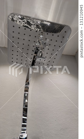 This is a sleek and modern showerhead that is specifically designed for luxury bathrooms This is a sleek and modern showerhead that is specifically designed for luxury bathrooms 131210945