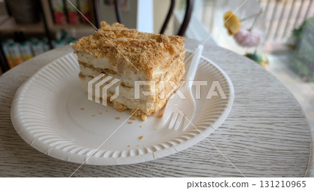 A Delicious Slice of Cake Beautifully Positioned on a Plate for Maximum Enjoyment 131210965