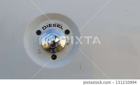 A Detailed CloseUp of the Diesel Fuel Cap on a Vehicle for Better Understanding 131210994