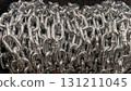 A Very Detailed CloseUp View of Lustrous Silver Metal Chains That Are Neatly Piled Together 131211045