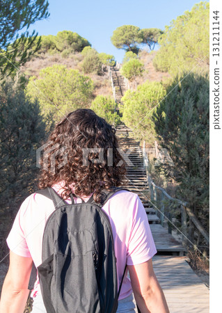 Traveler starting an uphill journey towards success. 131211144
