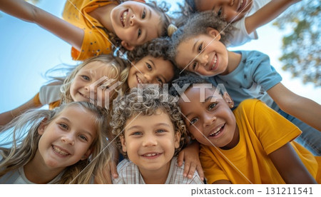 A group of happy children sharing a fun moment posing in a circle for a picture 131211541