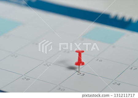 Calendar with a red push pin marking an important date, symbolizing scheduling and appointments Calendar with a red push pin marking an important date, symbolizing scheduling and appointments 131211717