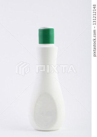 White plastic detergent bottle green cap isolated no background studio lighting 131212148