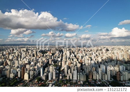 Expansive view of Sao Paulo skyline showcasing modern architecture and clouds 131212172