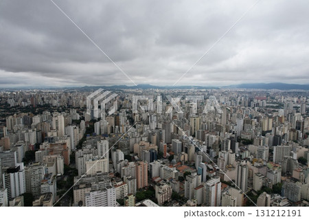 Expansive view of Sao Paulo cityscape under a cloudy sky Expansive view of Sao Paulo cityscape under a cloudy sky 131212191