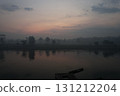 Dawn breaks over a misty river landscape in a tropical region 131212204