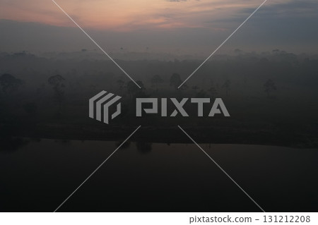 Misty morning landscape by a river in the Amazon region at dawn 131212208