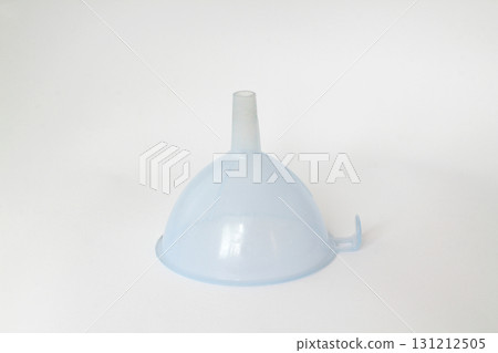 blue plastic funnel isolated on white background blue plastic funnel isolated on white background 131212505