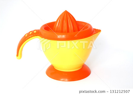 Plastic juice squeezer isolated on white background 131212507