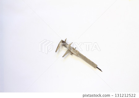 Very old used rusty iron calipers isolated on white background. 131212522