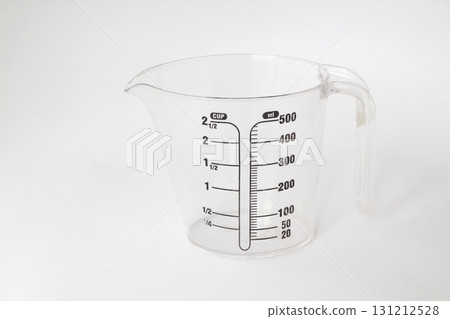 measuring cup isolated on white background. 131212528