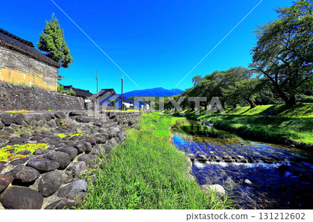 Rural landscape with a blue sky Rural landscape with a blue sky 131212602