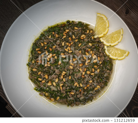 Spinach or Sabanekh with chicken a Mediterranean dish served with rice 131212659