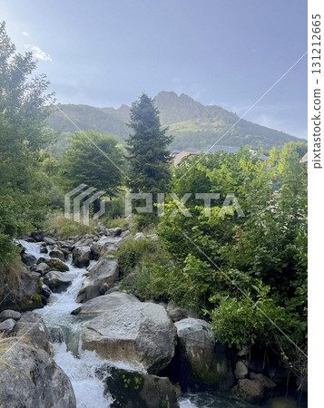 Scenic view of Cauterets mountains and stream in the Pyrenees region Scenic view of Cauterets mountains and stream in the Pyrenees region 131212665