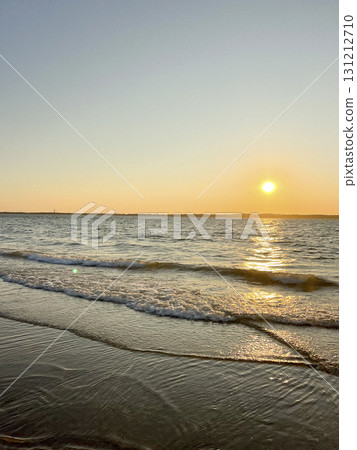 Sunset over Plage Peirere in Arcachon creates stunning beach landscape Sunset over Plage Peirere in Arcachon creates stunning beach landscape 131212710