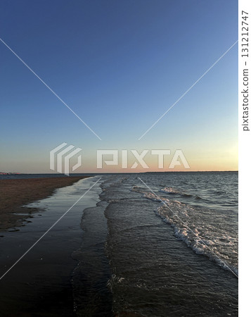 Sunset over Plage Peirere in Arcachon creates stunning beach landscape Sunset over Plage Peirere in Arcachon creates stunning beach landscape 131212747